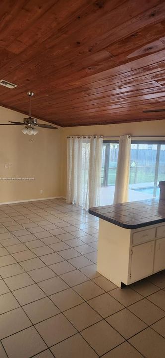 Kitchen / Family Room w. Vaulted Wood Ceiling