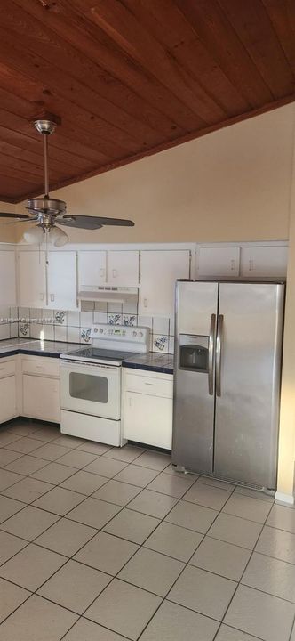 Kitchen w. Stainless Fridge