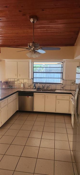 Kitchen w. Vaulted  wood ceiling