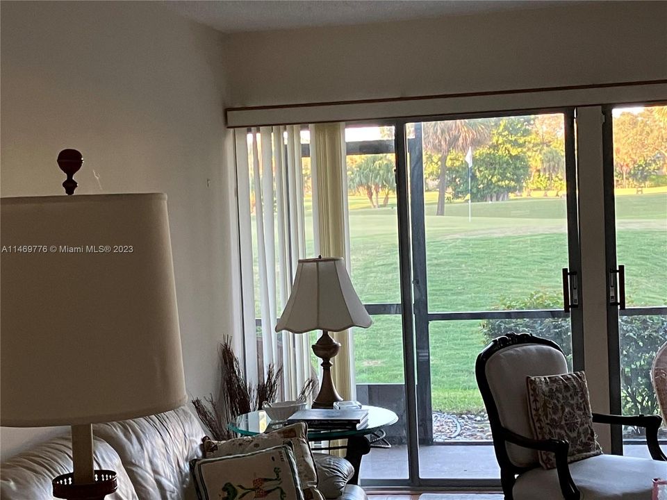 Large living room overlooking 1st green