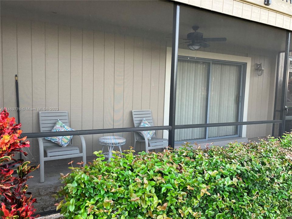 Private screen porch off the Master Bedroom