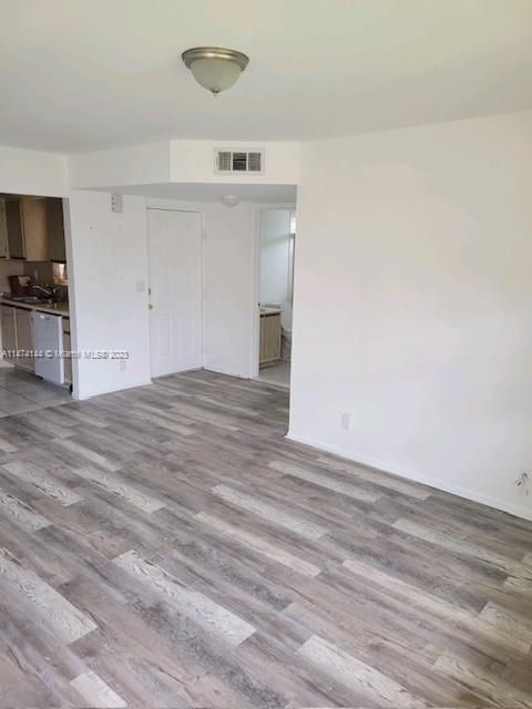 Living area with new vinyl flooring