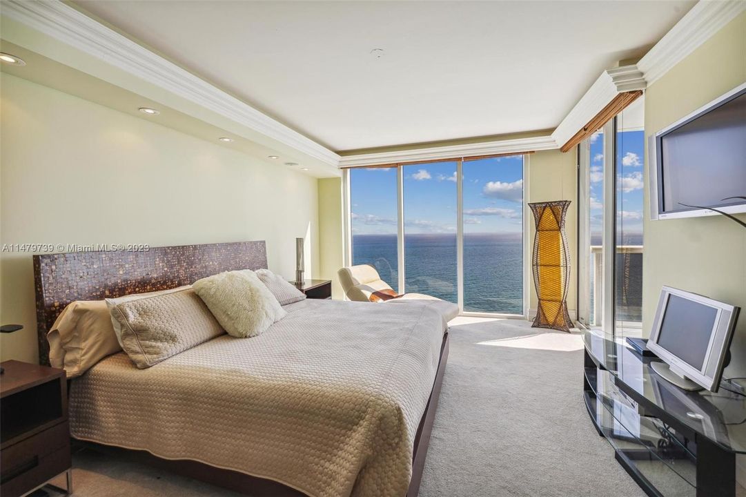 Master Bedroom with direct ocean views and indirect soffet lighting.