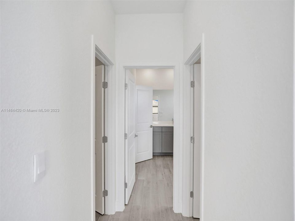 Two Walk-in closets in Primary Bedroom