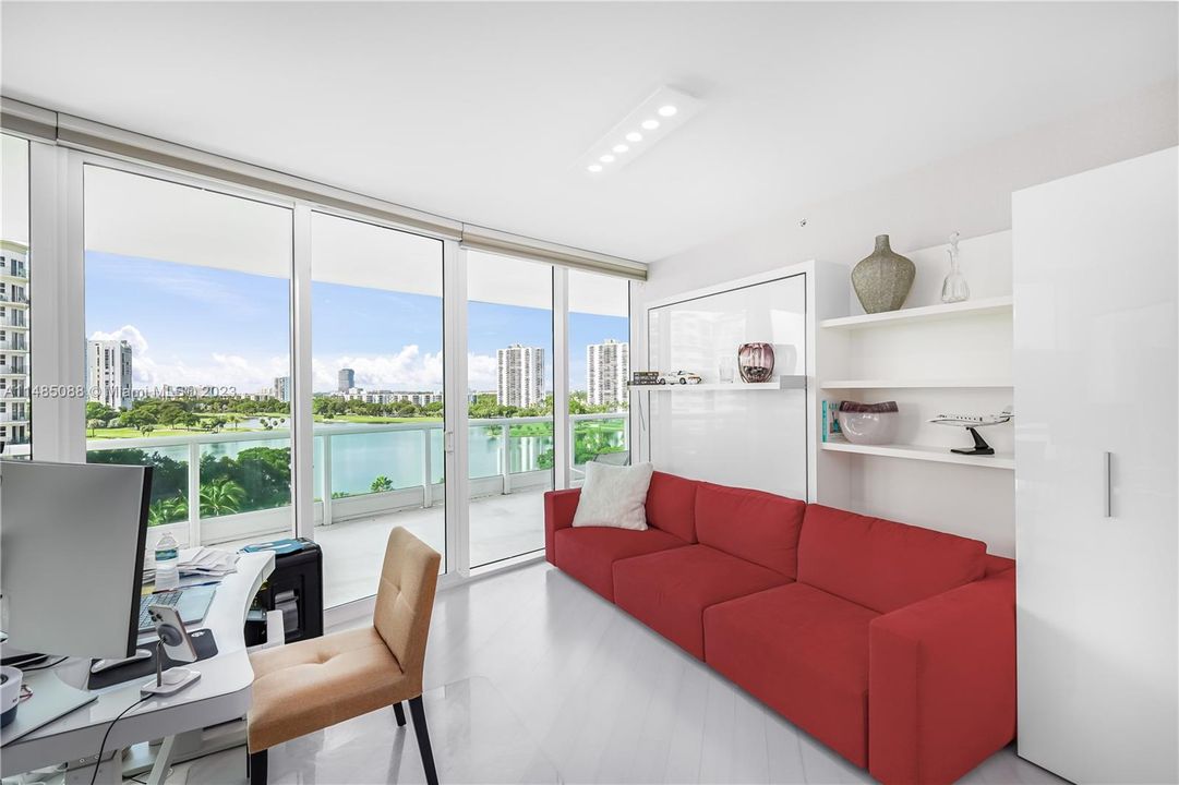 Den includes two murphy beds