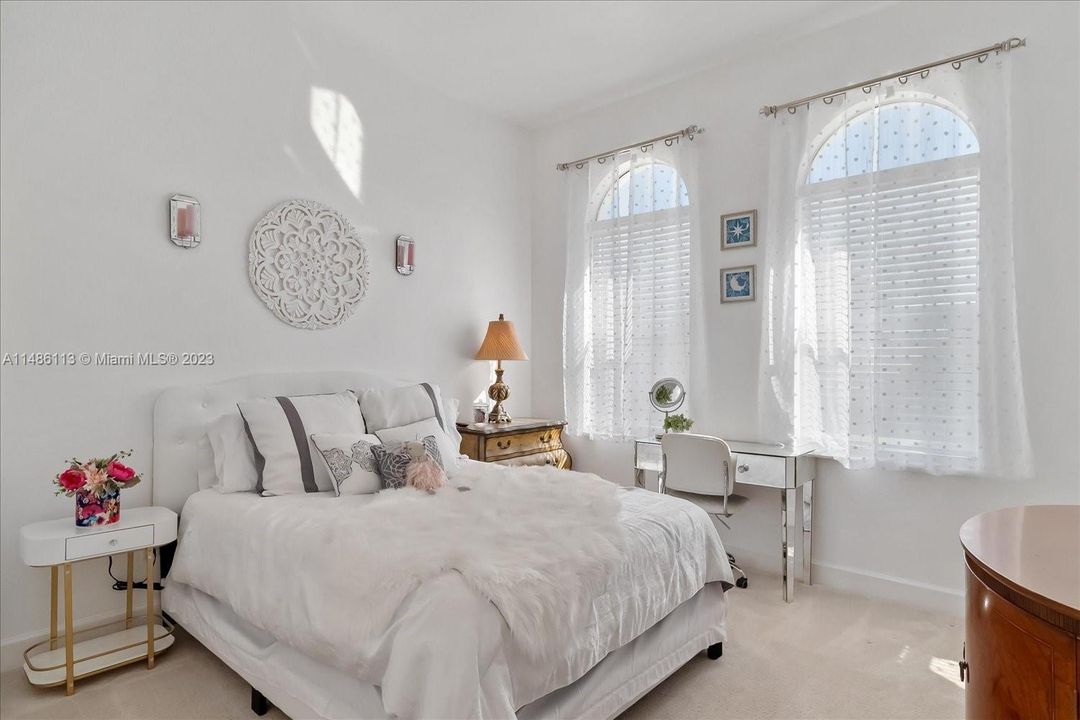 Enchanting bedroom that was designed and decorated for a little princess with a loft and large walk in closet.