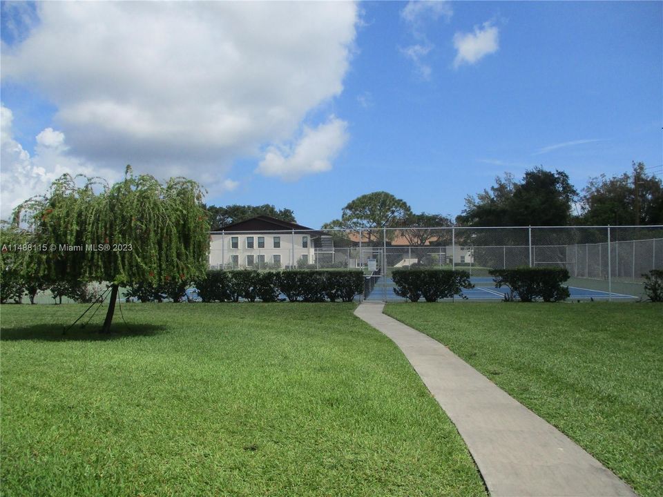 ENTRANCE TO PICKLE BALL/TENNIS COURTS FROM S BLDG.