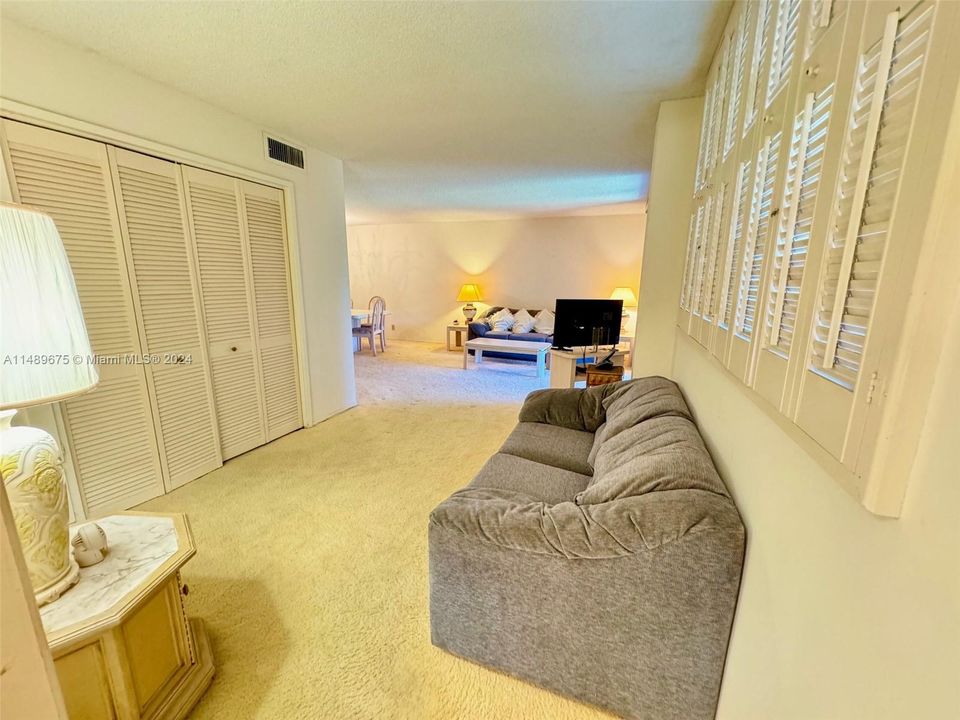Convertible family room with closets and full bathroom access could be 2nd bedroom.