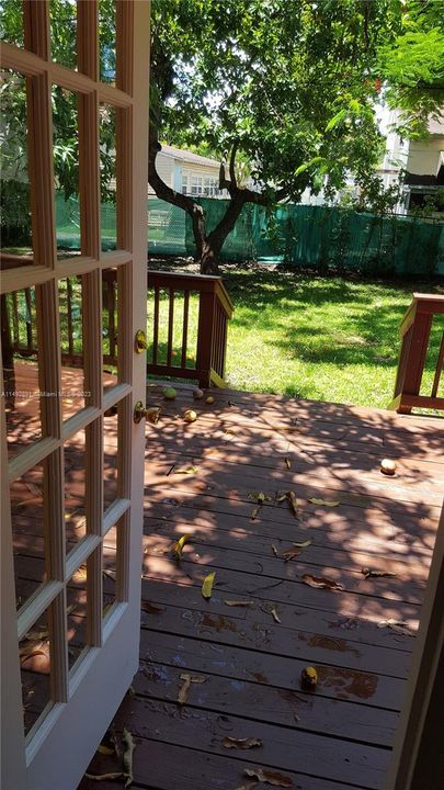 Kithcen doorway looking out to deck and yard