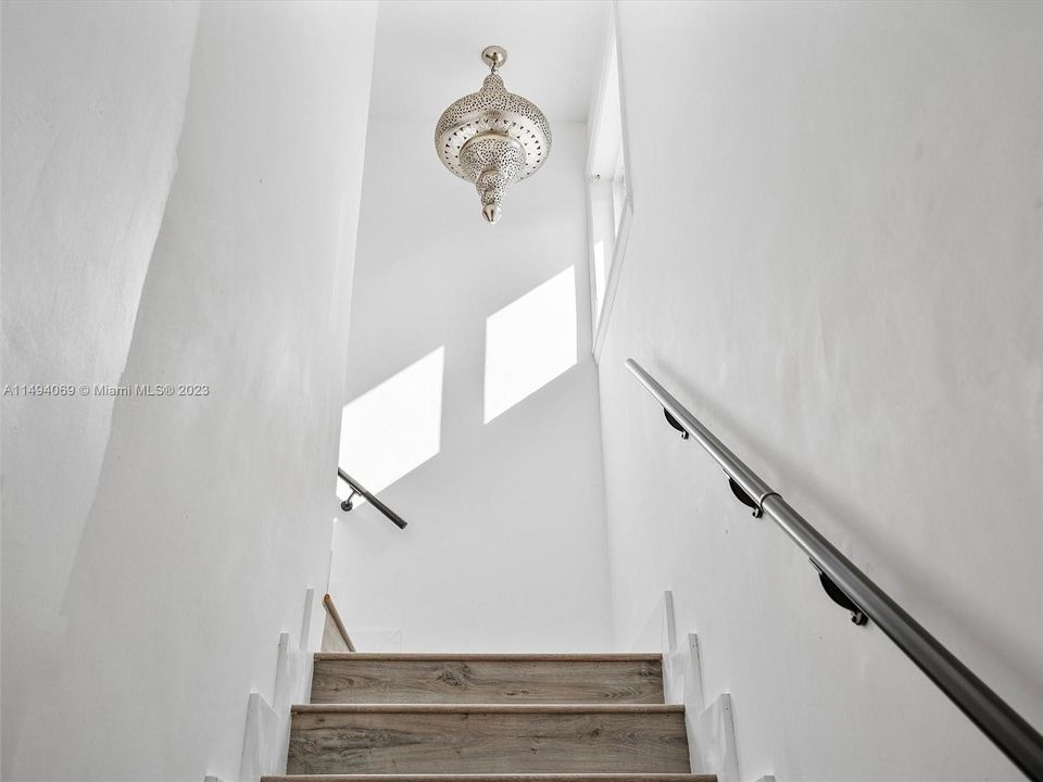 Stairway to Second Floor Master Suite