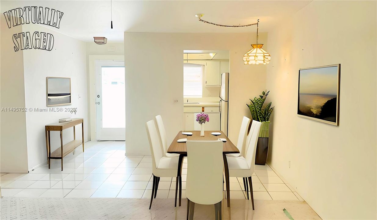 Dining room area - Staged Picture. In an effort to maintain transparency, we disclose that the contents within this image have been added digitally, and elements in this photograph including furnishings and decorations have been virtually staged, to provide a visual example of the property’s possibilities and potential design ideas; therefore, we encourage verifying on-site characteristics/conditions before making any decisions.