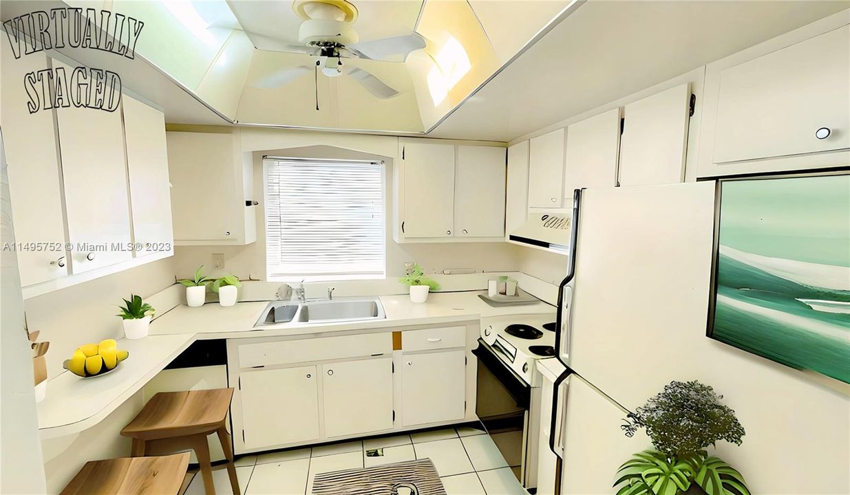 Kitchen - Staged Picture.In an effort to maintain transparency, we disclose that the contents within this image have been added digitally, and elements in this photograph including furnishings and decorations have been virtually staged, to provide a visual example of the property’s possibilities and potential design ideas; therefore, we encourage verifying on-site characteristics/conditions before making any decisions.