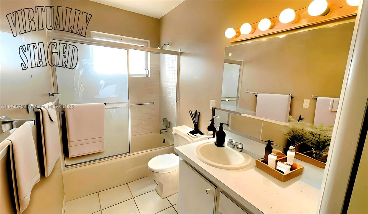Bathroom - Staged Picture. In an effort to maintain transparency, we disclose that the contents within this image have been added digitally, and elements in this photograph including furnishings and decorations have been virtually staged, to provide a visual example of the property’s possibilities and potential design ideas; therefore, we encourage verifying on-site characteristics/conditions before making any decisions.