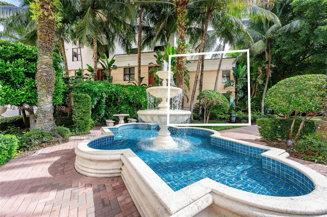 Beautiful fountain and meditation area, steps  from unit. Property highlighted in the picture.