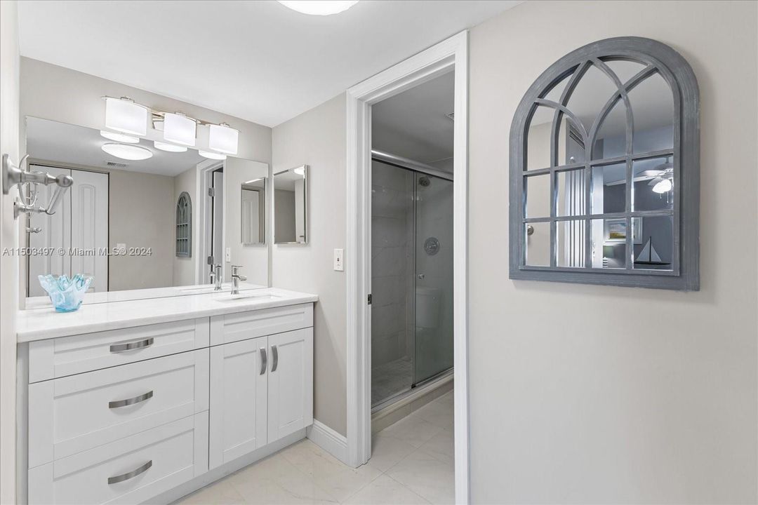 Main Bathroom with extra large mirrors and space.20400 W Country Club Drive, #316, Aventura, FL.