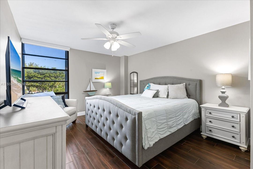 Main Bedroom with panorama window, updated flooring and calming vibes.20400 W Country Club Drive, #316, Aventura, FL 33180. Biscaya Condominium.