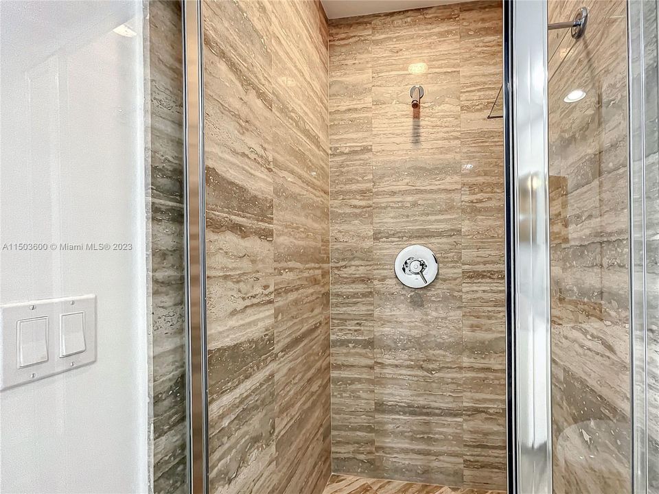 in suite bathroom in each bedroom