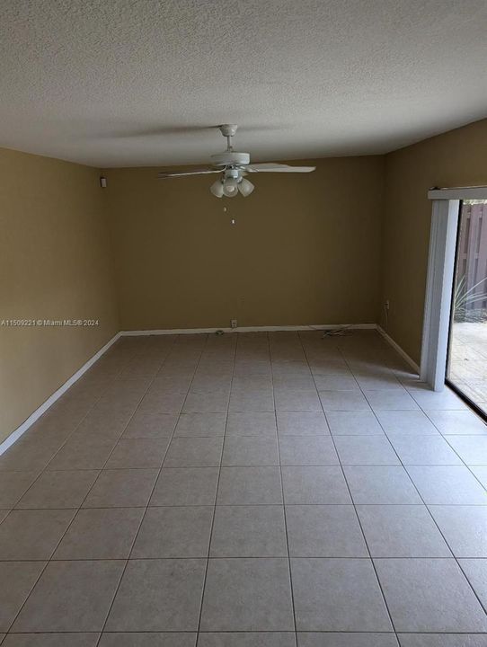 Large Living Room with Sliders to Courtyard