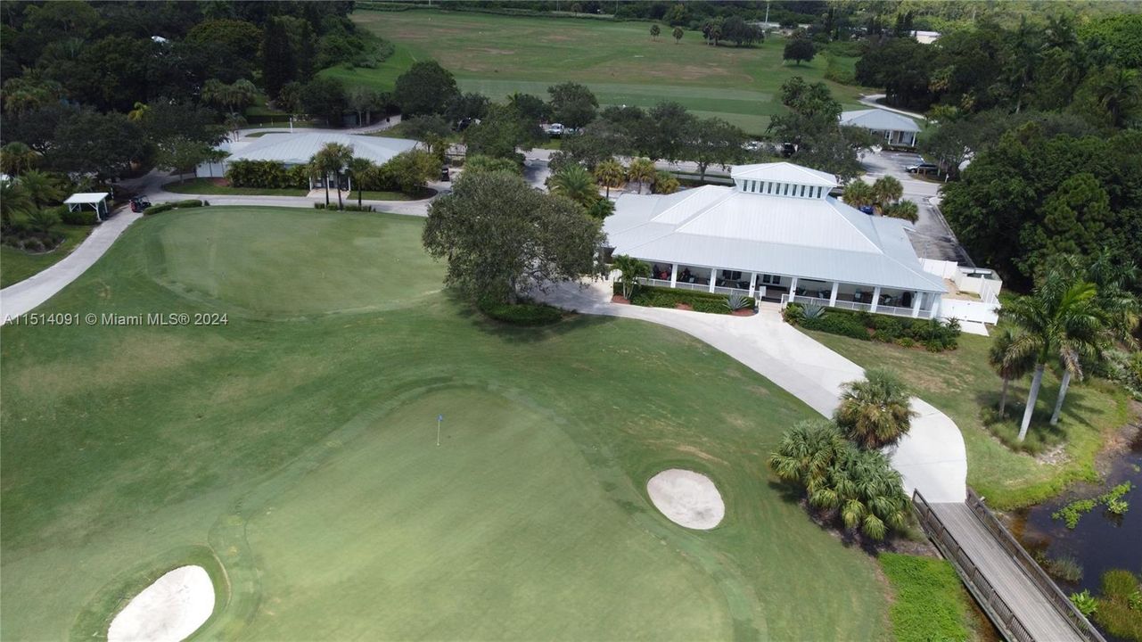 18th green with Clubhouse. Putting green top left, driving range far top.