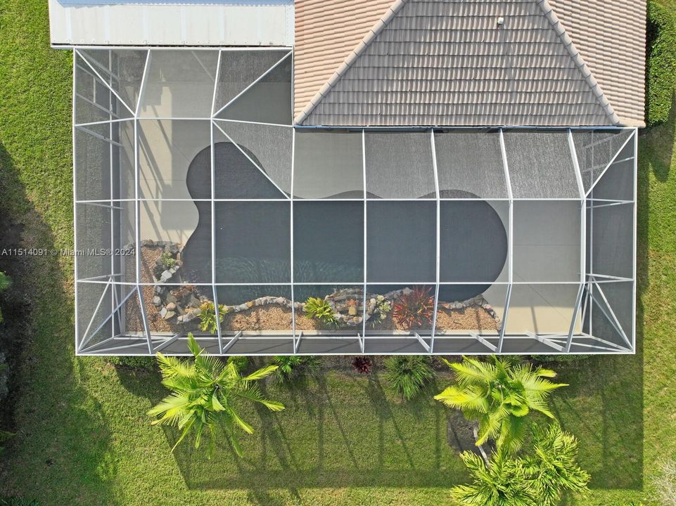 Lagoon pool with rock grotto waterfalls