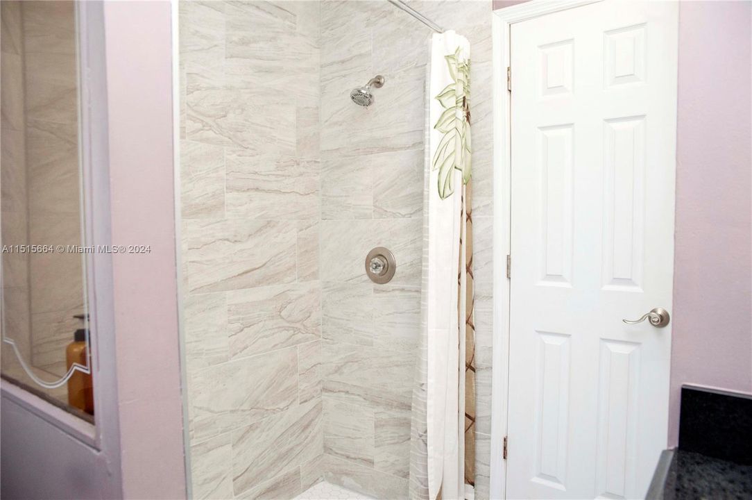 Fully Equipped Master Bathroom with Shower