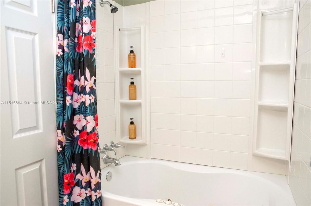 Guest Bathroom with a Shower and a Tub