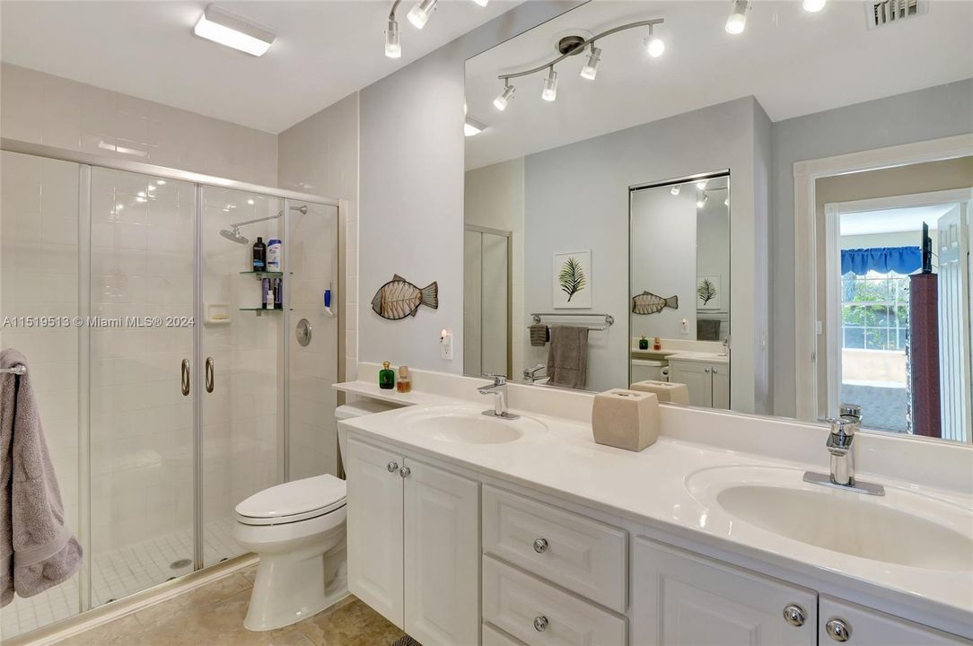 Upgraded primary bathroom - Hansgrohe faucets, new shower doors & under cabinet lighting