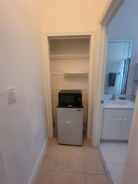 hallway to bathroom, linen closet