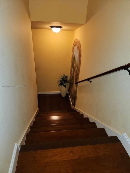 stairway has wood stairs