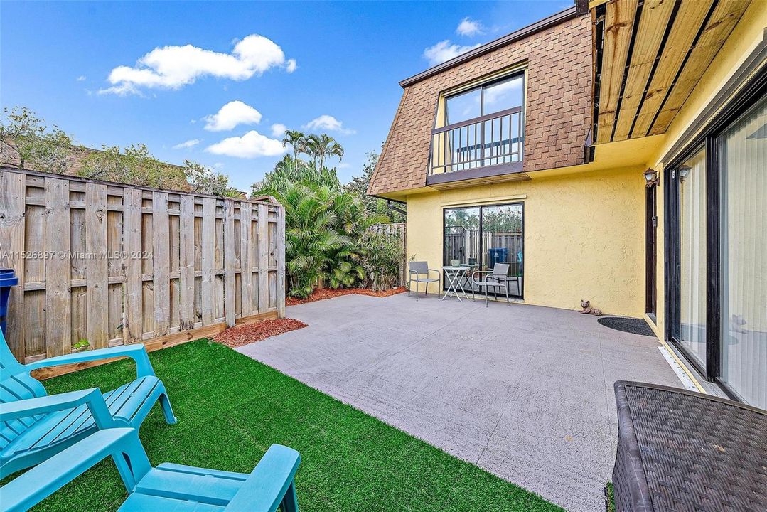 Welcome Home to your private patio fenced yard.