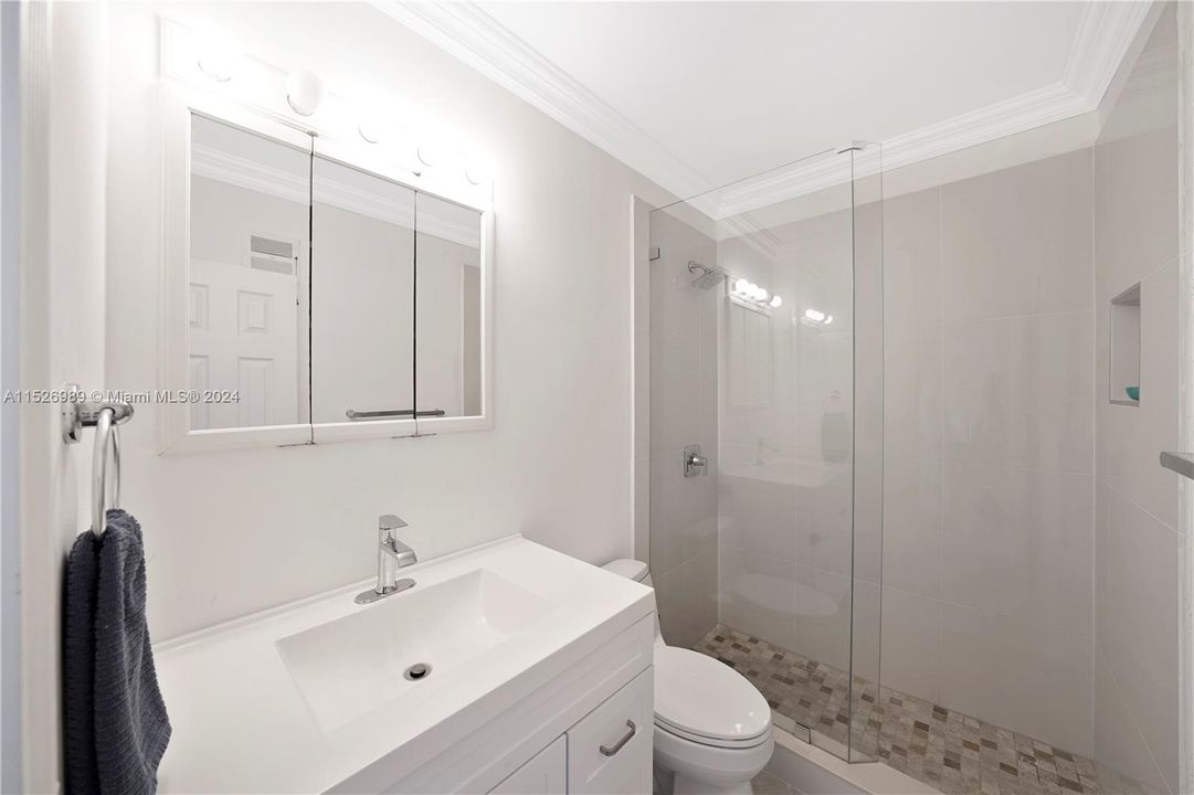 updated bathroom with GLASS SHOWER