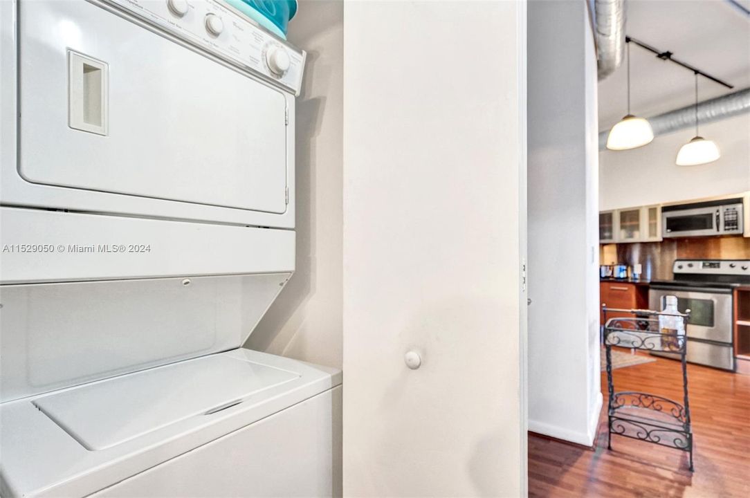 The unit has a stackable washer/dryer.