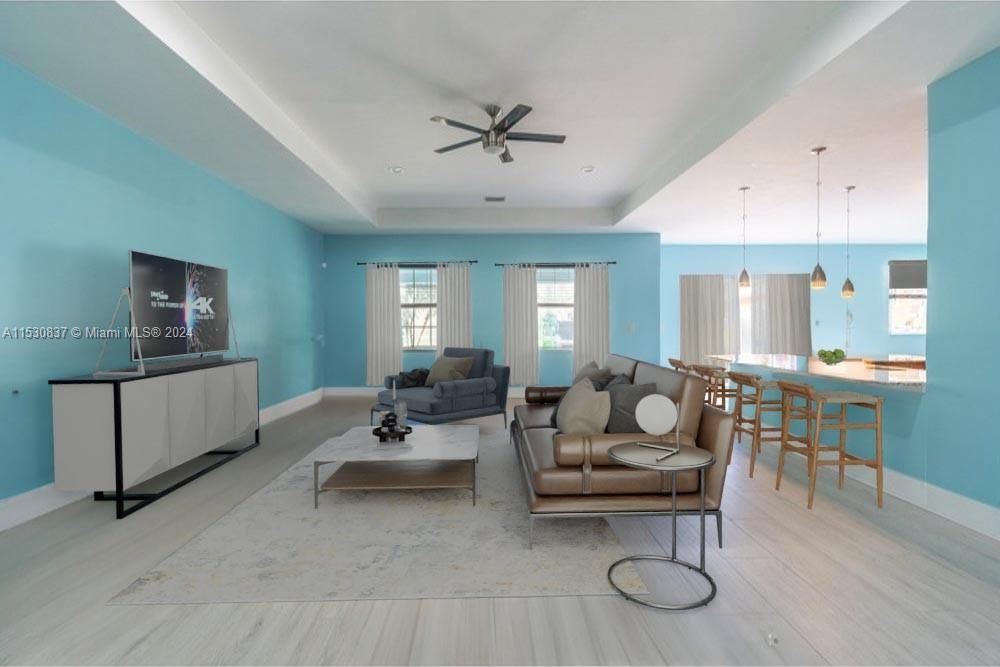 Some photos are virtually staged to give an idea of how the home would look with updated furniture.  the original photos are still included in the MLS