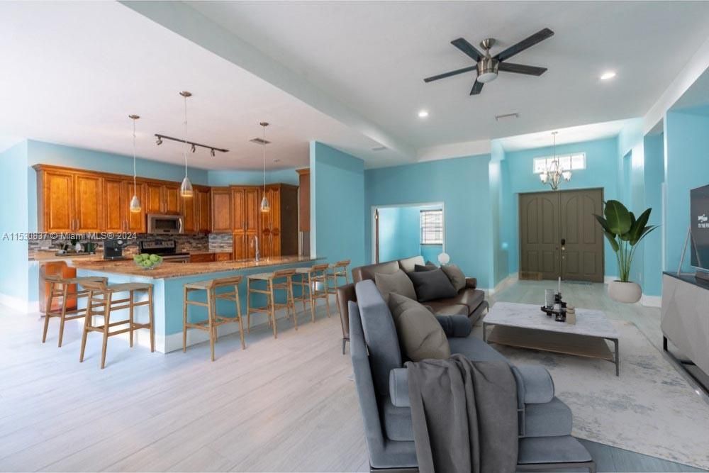 Some photos are virtually staged to give an idea of how the home would look with updated furniture.  the original photos are still included in the MLS