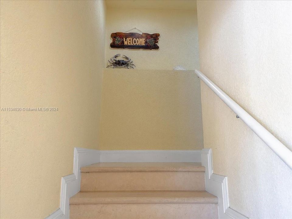 Stairwell to Front Door Entrance