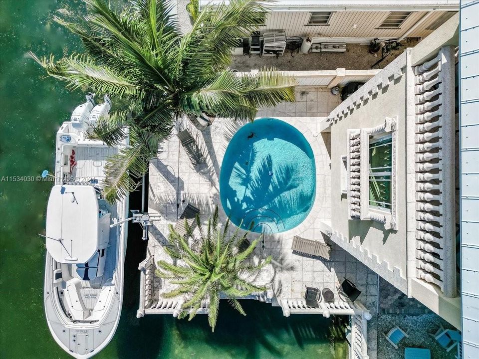 Aerial Pool, Deck, and Boat Lift View