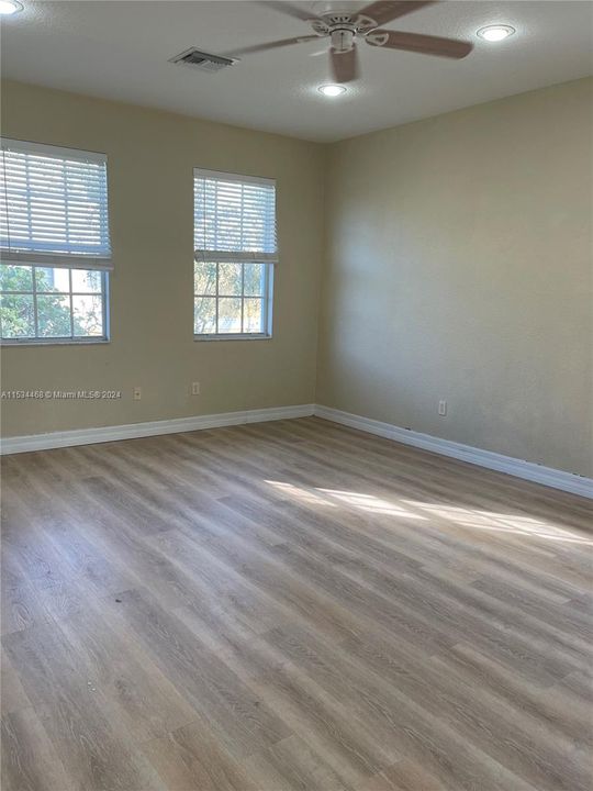 All new vinyl flooring.  Perfect as guest quarters, home office, gum or playroom.