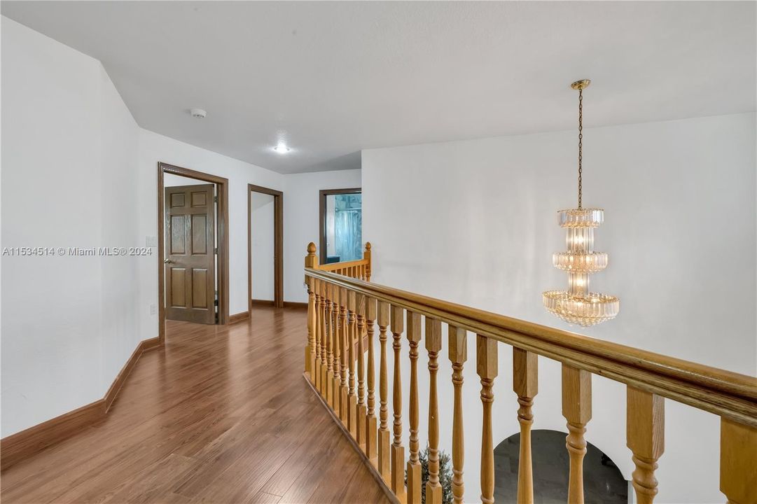 Hallway to upstairs bedrooms