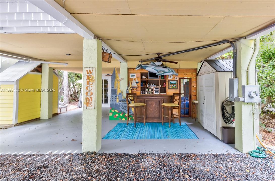 Downstairs EntertainingCovered area provides a great spot for year 'round entertaining..