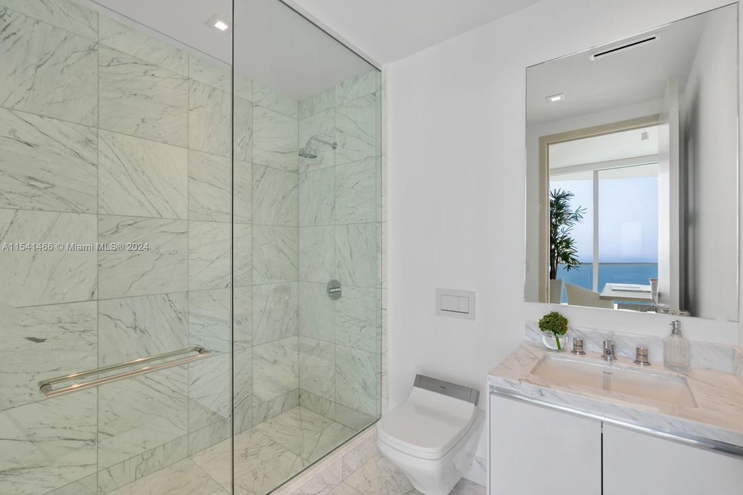 secondary bathroom with natural light and west view