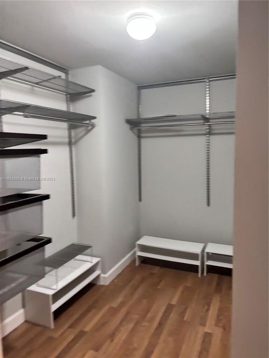 PRIMARY BEDROOM WALK-IN CLOSET