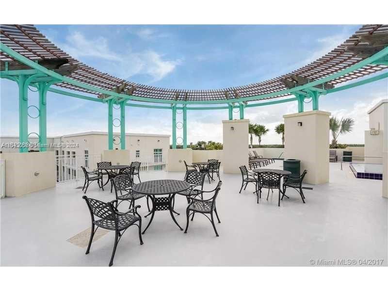 DECK AREA ADJACENT TO POOL AND HOT TUB