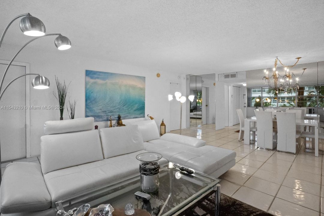 Living room flows nicely into dining area.