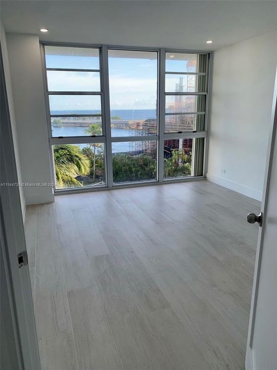 2nd bedroom with wall to wall bay views
