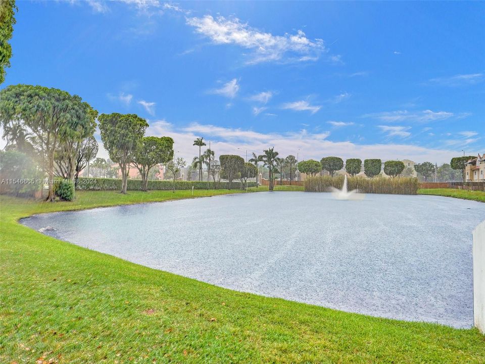 BEAUTIFUL LAKE AT THE ENTRANCE OF THE PRESTIGIOUS RIVIERA AT CORAL LAKES COMPLEX