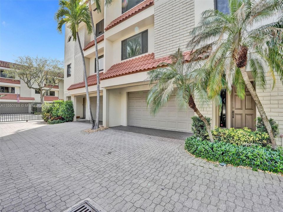 You'll love having a 2 car garaged behind a securely gated complex