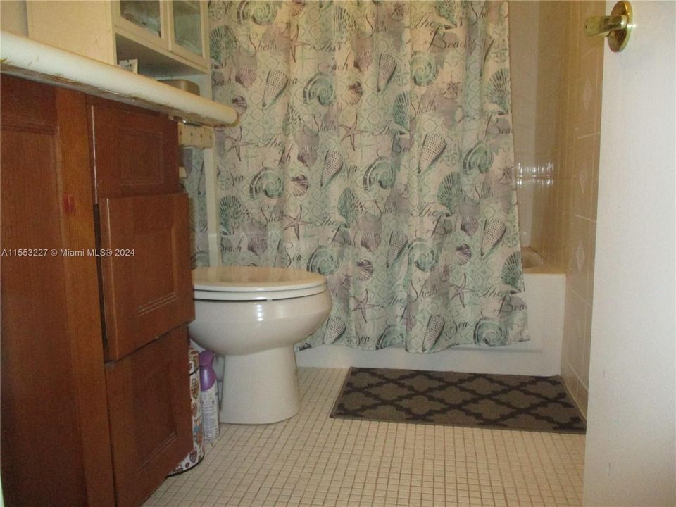 BATHROOM WITH A TUB & SHOWER