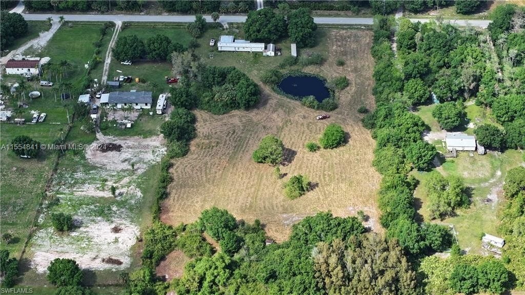 1075 Case Road, LaBelle, Florida, 4.58 acres in no deeded area of Hendry County, Cleared with Pond