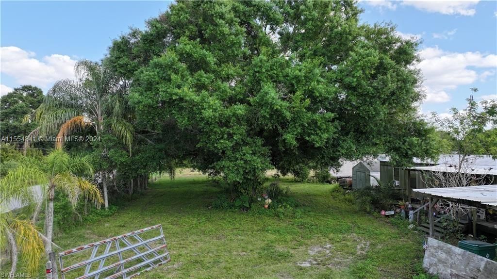 1075 Case Road, LaBelle, Florida, 4.58 acres in no deeded area of Hendry County, Cleared with Pond