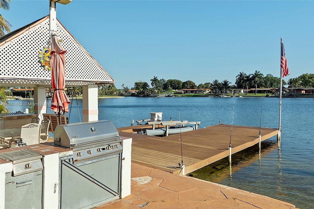 Backyard with Pool, Pavers, Gazebo with Grill, Trees, Dock, Ramp and Sun Deck